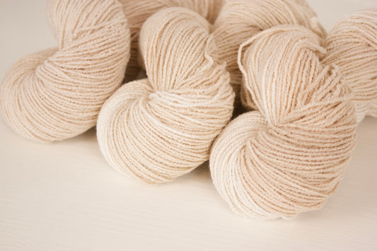 Mylk Tea Colourway - Creamy pale beige with a light variegation like swirls of soy milk in a cup of earl grey.