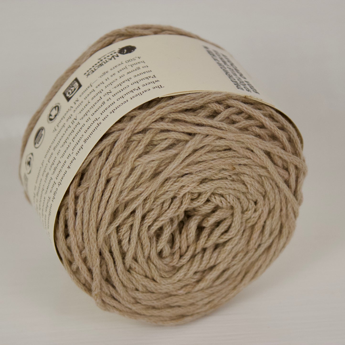 Pakucho Avocado is a natural warm, browny green with a plied texture. It's light and very soft.